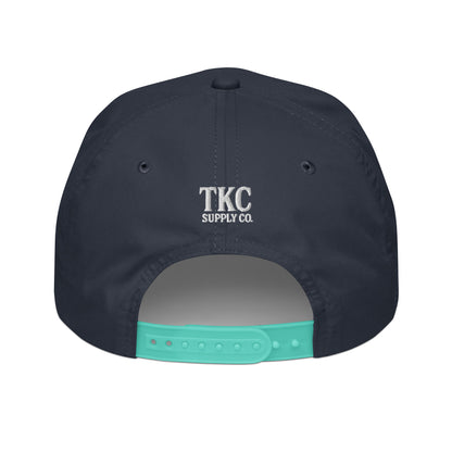 Back of navy 10NINE rope hat with snapback closure