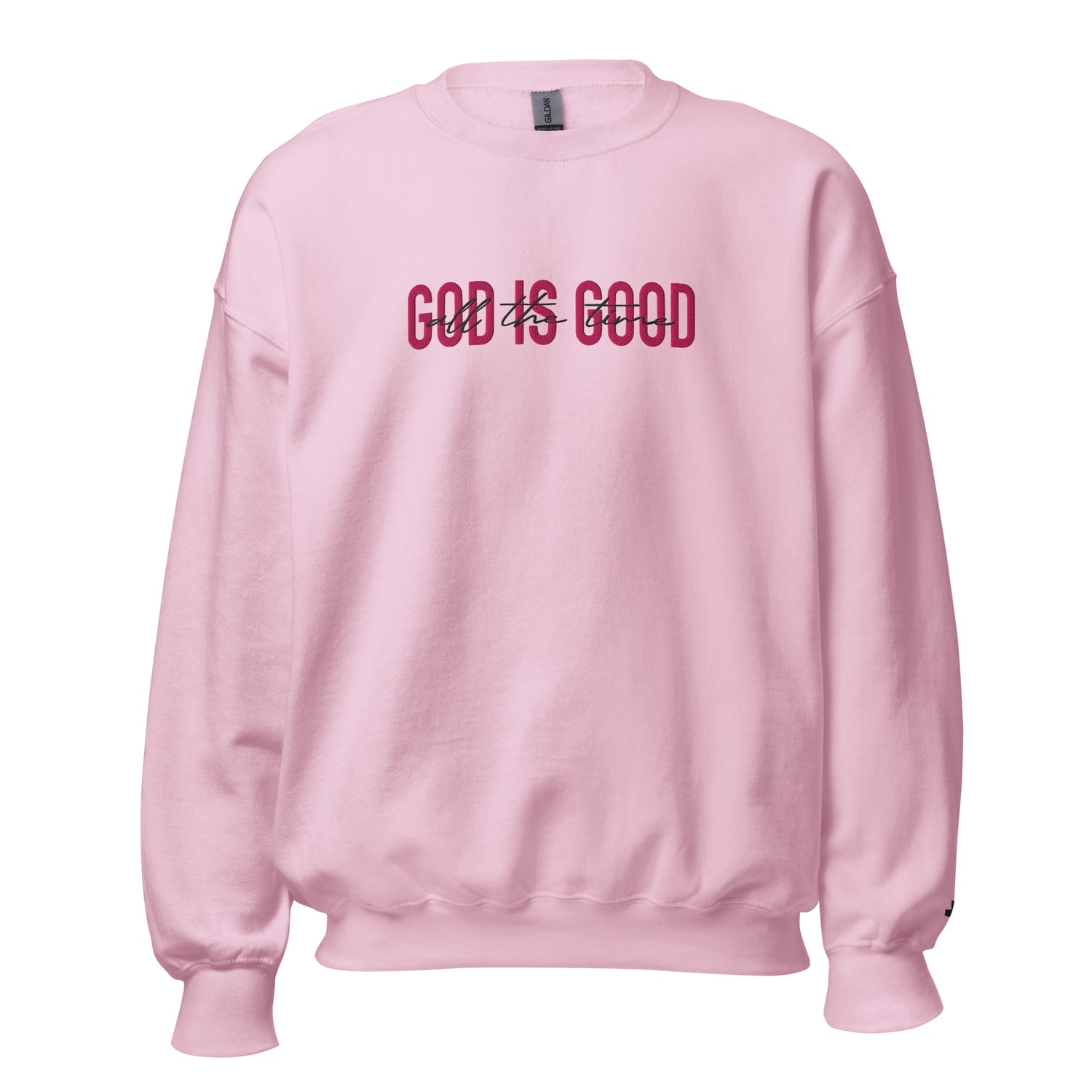 Pink “God Is Good” embroidered Christian sweatshirt with bold red lettering, faith-based apparel by Thy Kingdom Come Supply Co.