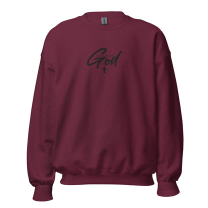 Front view of maroon Child of God embroidered crewneck sweatshirt from the ONE12 Collection by TKC Supply Co., featuring John 1:12
