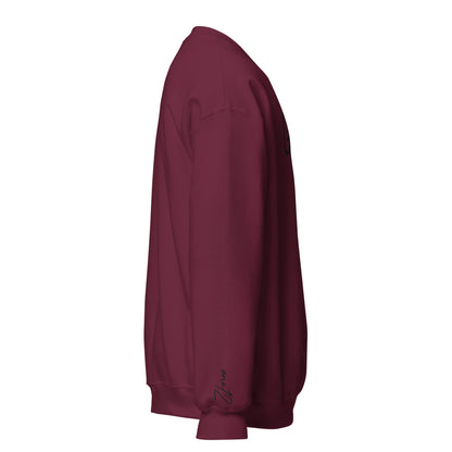 Right side view of maroon Child of God embroidered crewneck sweatshirt with cursive one12 wrist embroidery, inspired by John 1:12
