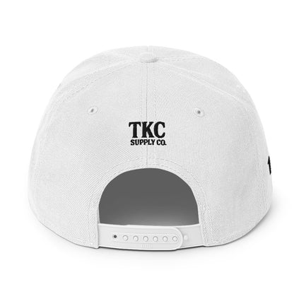 Back of white Christian hat with TKC Supply Co. logo above snap