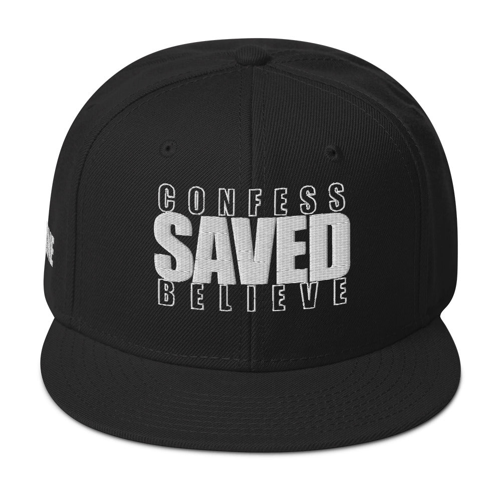 Black Christian snapback hat with Confess Believe SAVED text on front