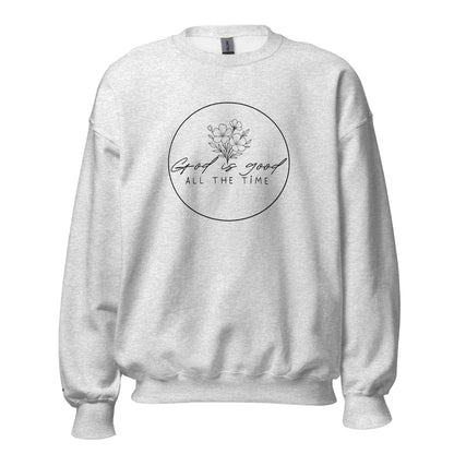 Ash grey women’s faith sweatshirt with “God is good all the time” floral design and embroidered cross on wrist – TKC Supply Co.