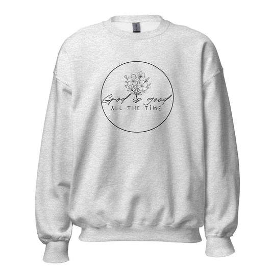 Ash grey women’s faith sweatshirt with “God is good all the time” floral design and embroidered cross on wrist – TKC Supply Co.