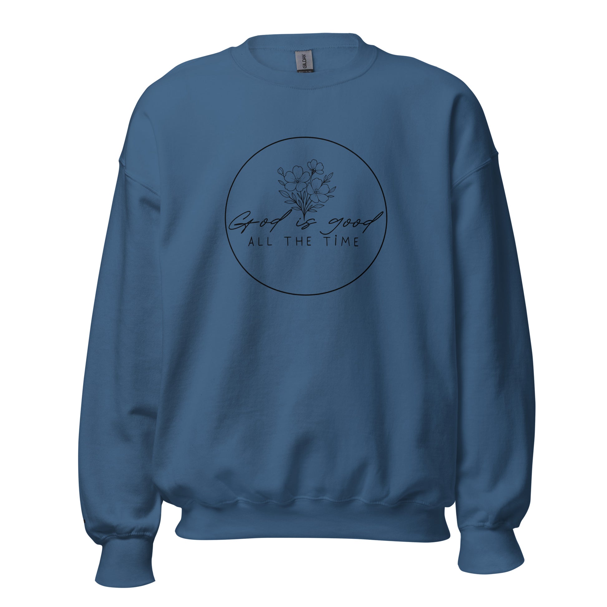 Indigo blue women’s faith sweatshirt with “God is good all the time” floral design and embroidered cross on wrist – TKC Supply Co.