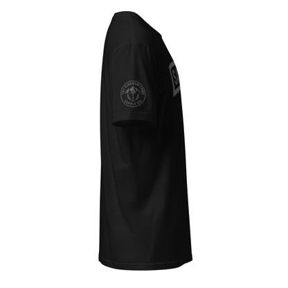 Side view of the SAVED Military Tab Tee with TKC Supply Co. emblem sleeve print, black.